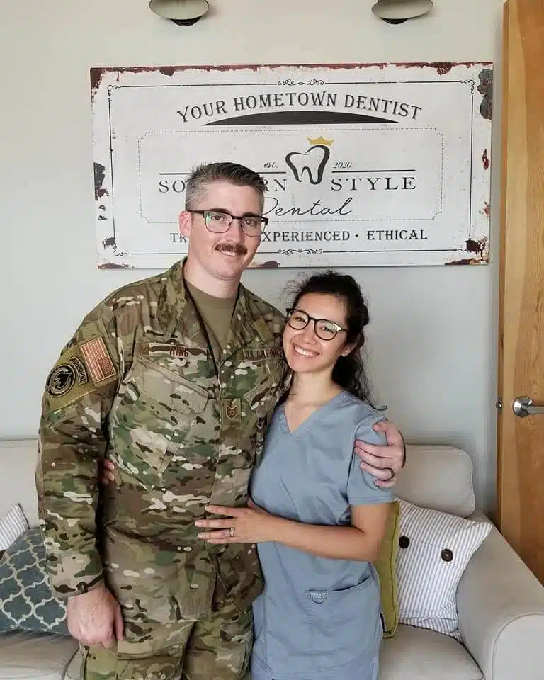 A military officer and a dental professional smiling at Southern Style Dental, your friendly neighborhood dentist.