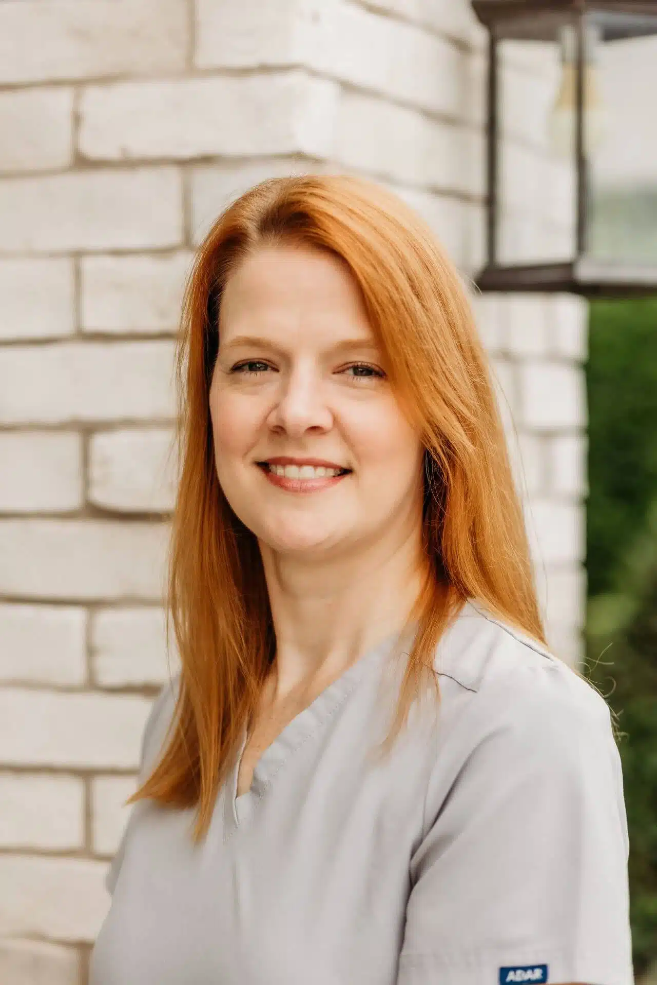 Smiling female dentist at Southern Style Dental office, dedicated to providing top-notch dental care.